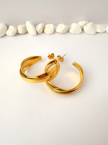 Argollas Doradas Cruzadas elegantes - 3cm