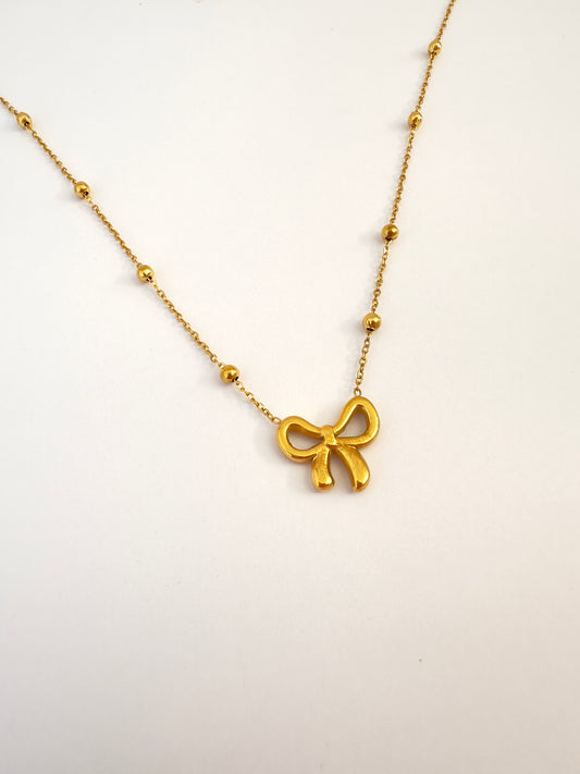 ✨ Collar Lazo Dorado Charm