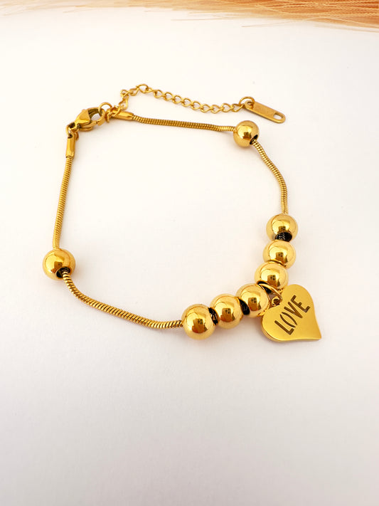 ✨ Pulsera Dorada Love Esferas
