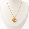 Collar Flor giratoria para la ansiedad - Enchape de Oro 18k