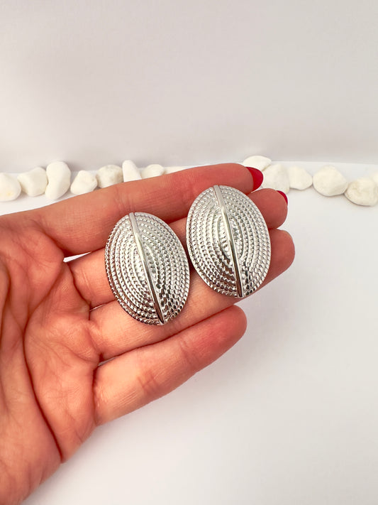 Aros plateados textura solar