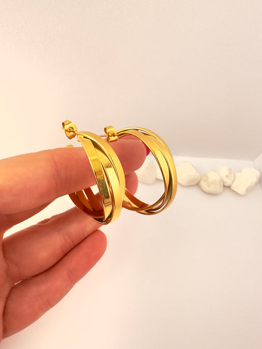 Argollas Doradas Cruzadas elegantes - 3cm