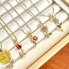Lote Floral de 6 Collares – Baño de Oro 18K