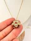 Collar Flor giratoria para la ansiedad - Enchape de Oro 18k