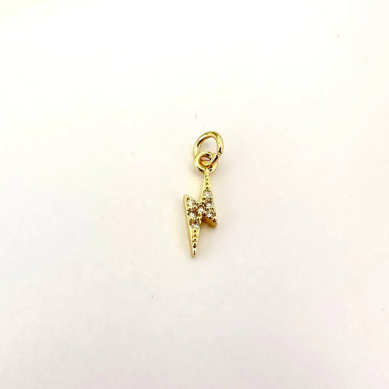 ⭐ Dije Rayo Brillante – 1,5 cm - Baño de Oro - Glamora