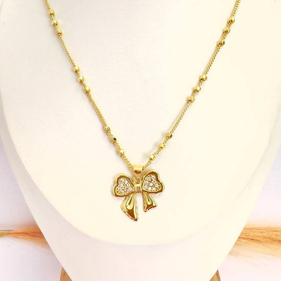 Collar Moño Brillante – 50 cm - Baño de Oro - Glamora