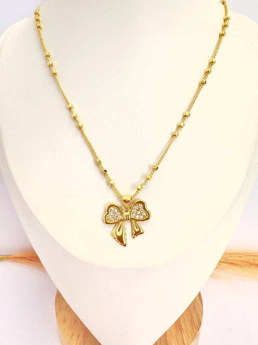 Collar Moño Brillante – 50 cm - Baño de Oro - Glamora