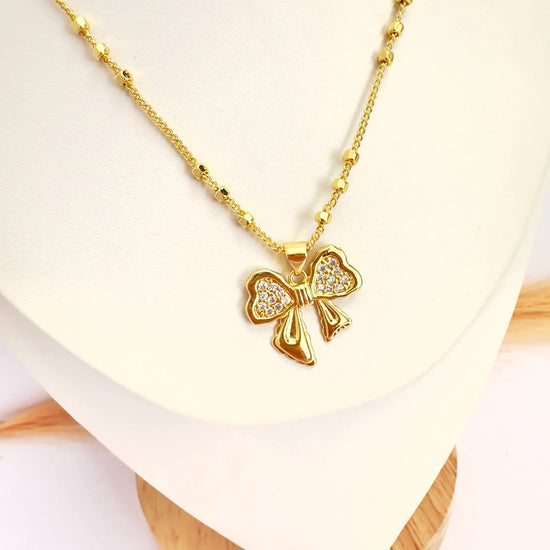 Collar Moño Brillante – 50 cm - Baño de Oro - Glamora