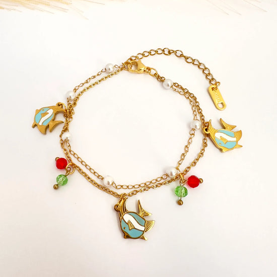 Pulsera Marina con Dijes de Pez y Detalles de Color - Glamora